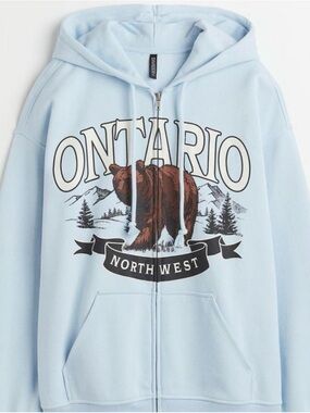 H&M Light Blue Ontario Bear Graphic Zip Hoodie Size Large NWT